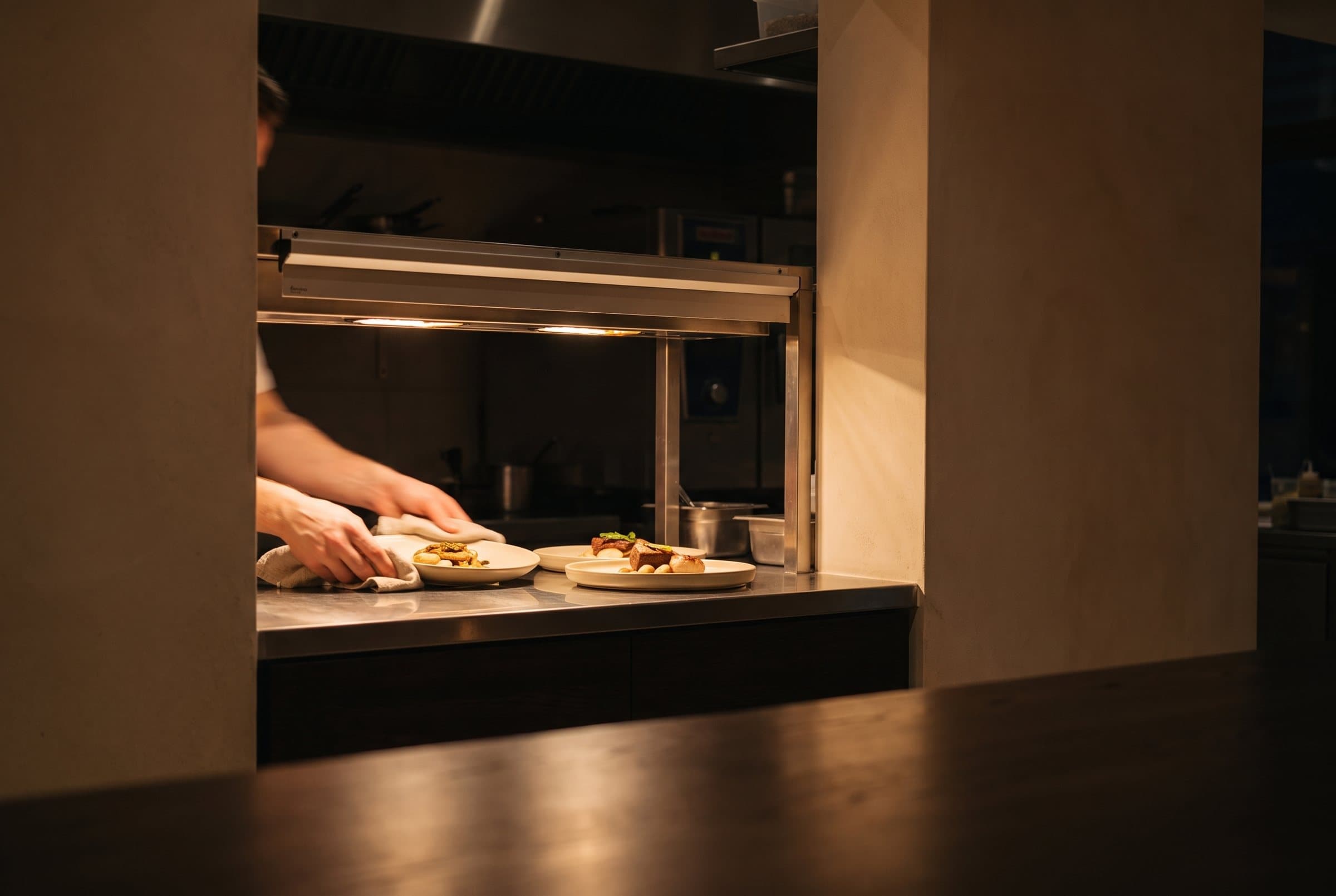 The kitchen pass seen from the dining room