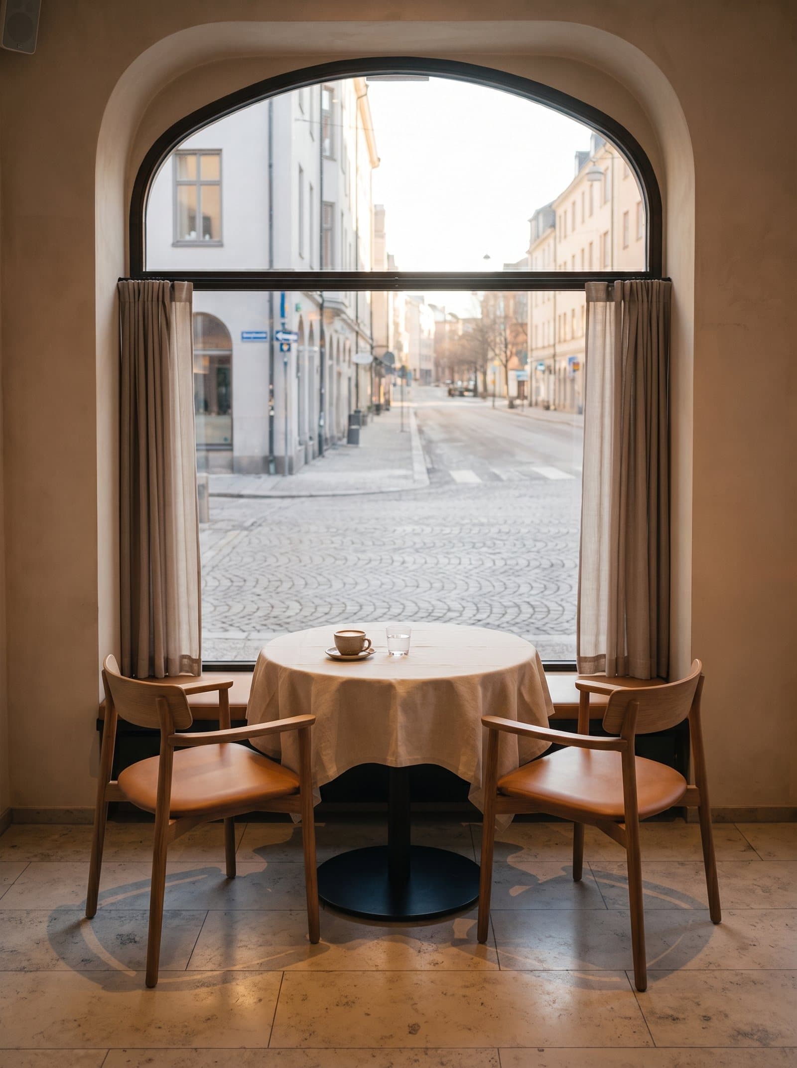 A table for two at the arched window